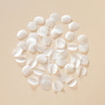 Load image into Gallery viewer, White circle biodegradable confetti pieces arranged on a beige background - The Confetti Farm
